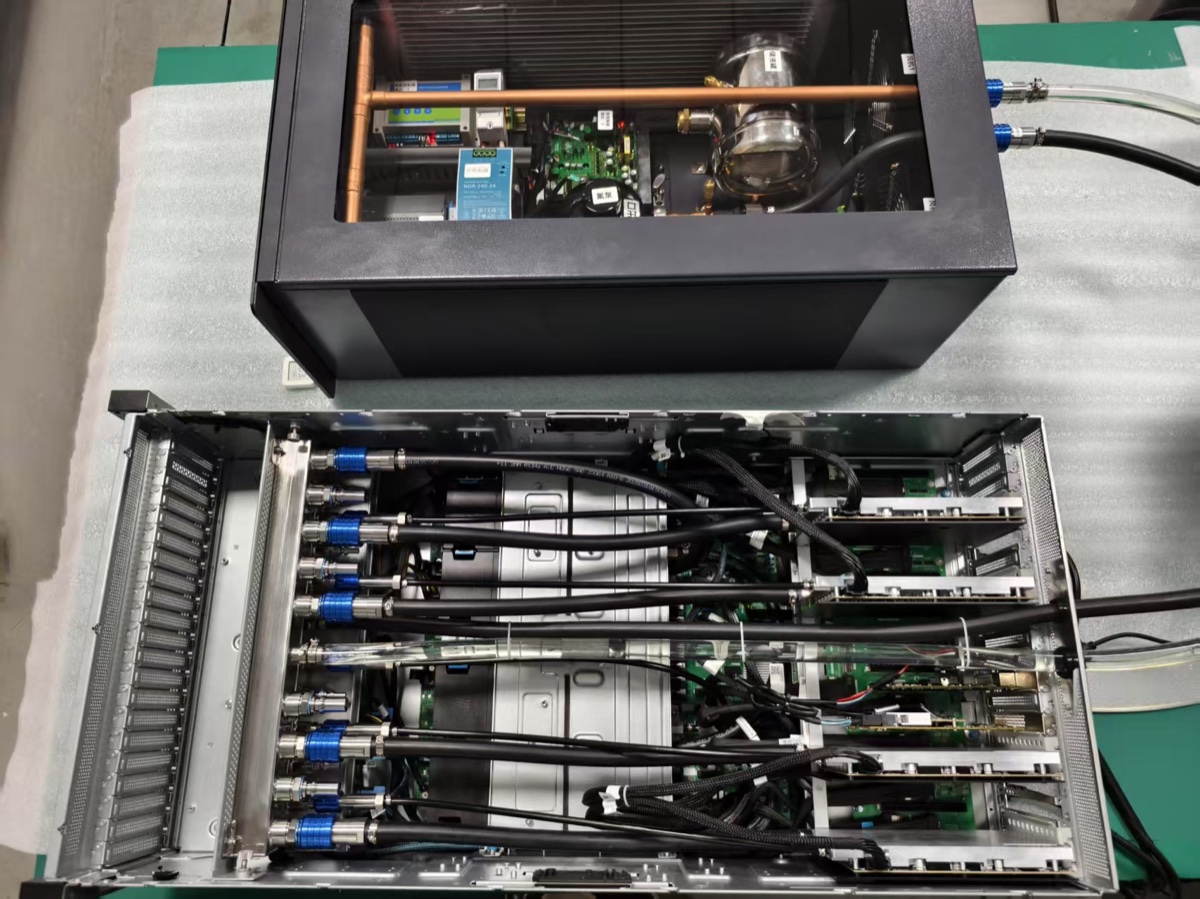 Cooling Distribution Unit with pump and copper manifold alongside open server chassis with liquid cooling